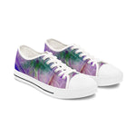 Pair of sneakers with a colorful palm tree design on a white background