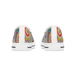 Pair of womens white sneakers with colorful abstract patterns on a white background
