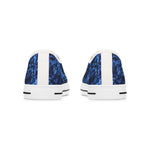 Womens white sneakers with blue marbled pattern on a white background