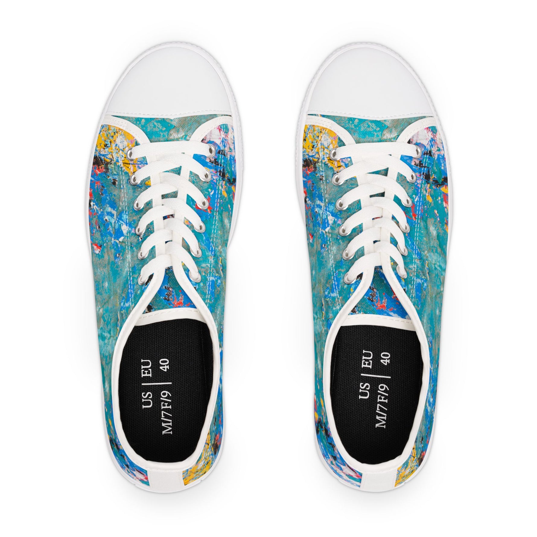 Pair of womens sneakers with colorful abstract design on a white background