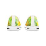 Pair of sneakers with colorful abstract design on a white background