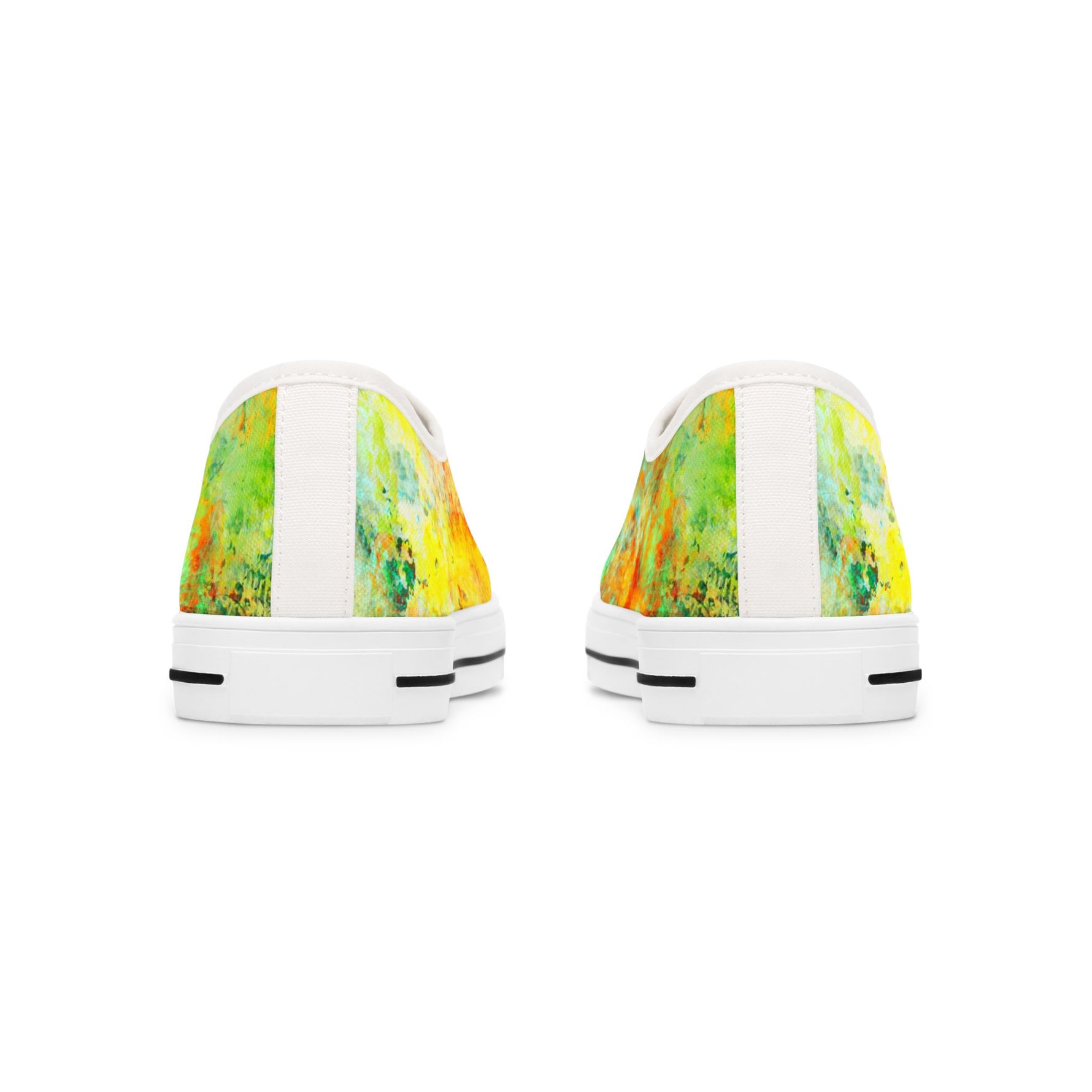 Pair of sneakers with colorful abstract design on a white background