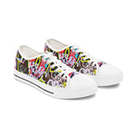 Pair of womens sneakers with colorful graffiti pattern on a white background