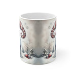 Mug with winter scene design featuring candy canes and snowmen on a white background