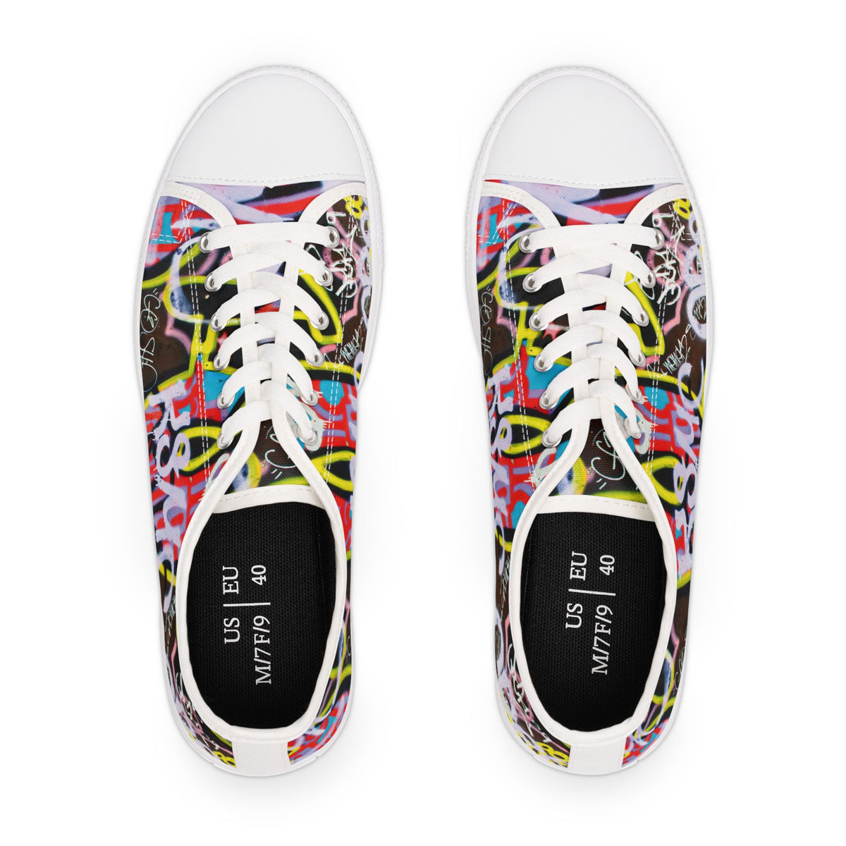 Pair of colorful womens sneakers with graffity patterns on a white background