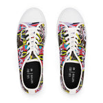 Pair of colorful womens sneakers with graffity patterns on a white background