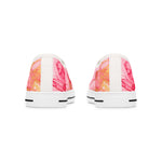 Pair of sneakers with a colorful marbled pattern on a white background