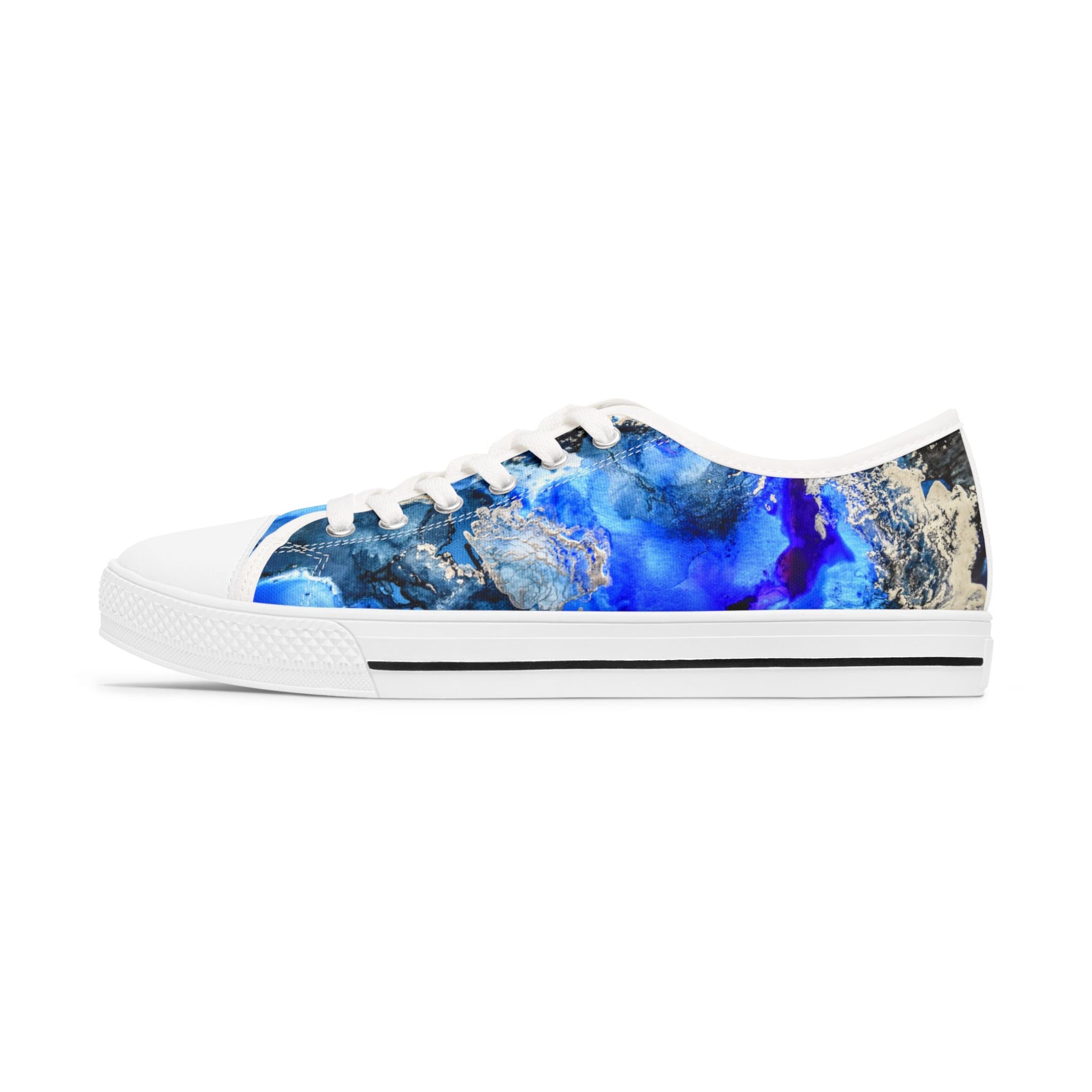 Sneaker with a blue and white abstract pattern on a white background
