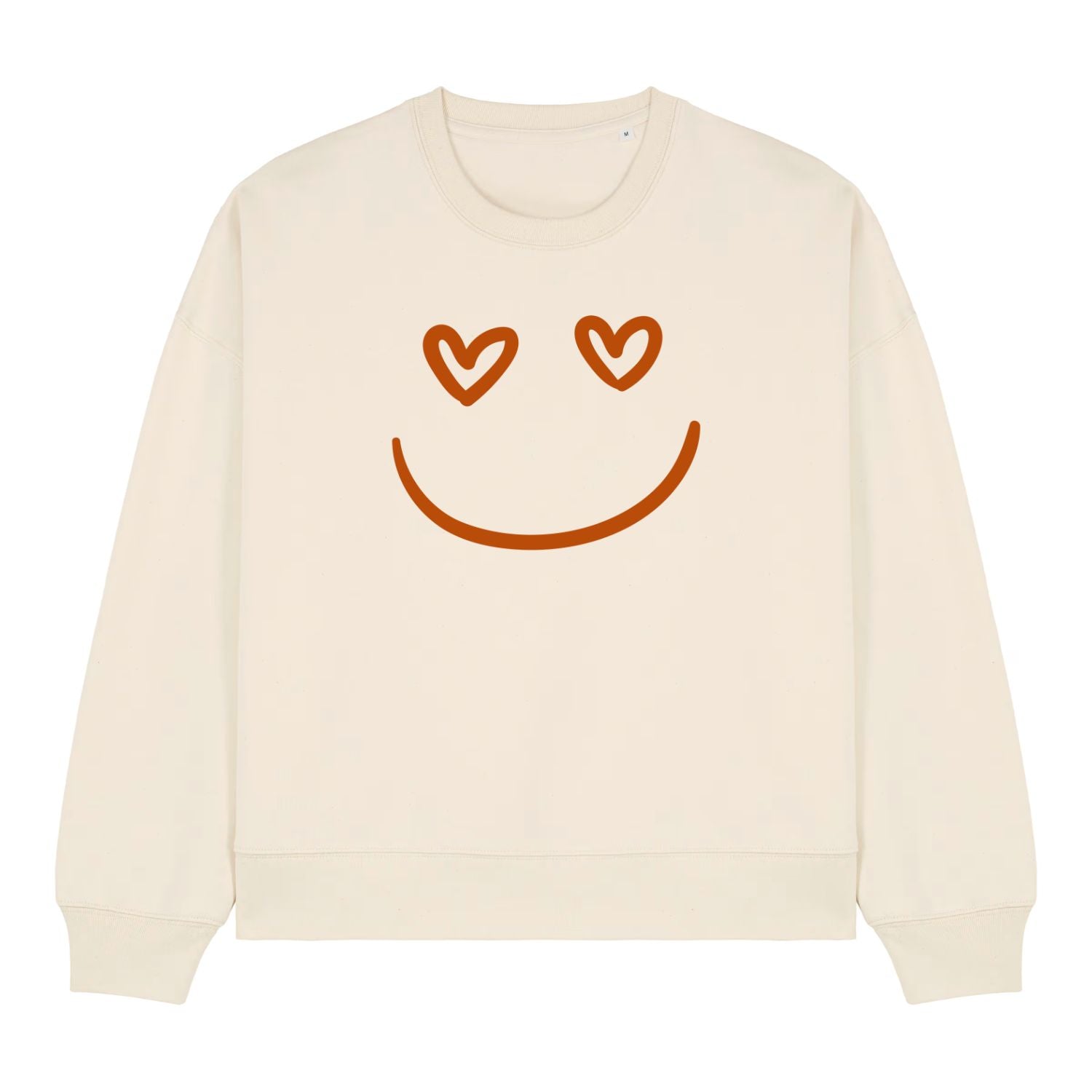 Stanley/Stella Beige sweatshirt with a smiley face design featuring heart eyes on a white background