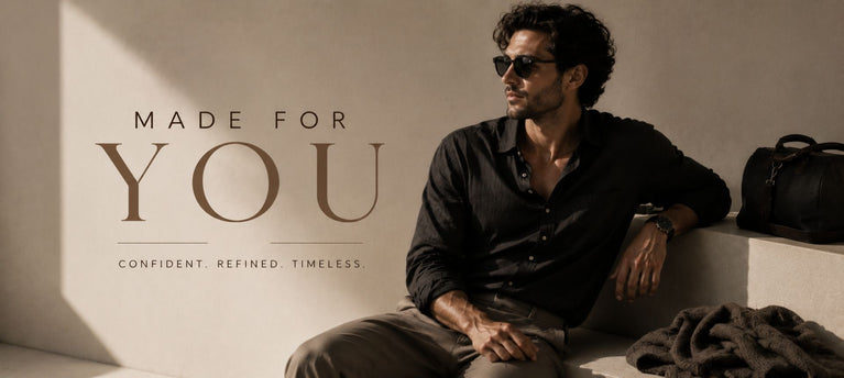 Man sitting with text 'Made for You' in a stylish setting