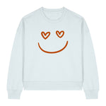 Stanley/Stella White sweatshirt with a smiley face design featuring heart eyes on a white background