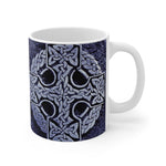 Mug with Celtic knot design on a white background