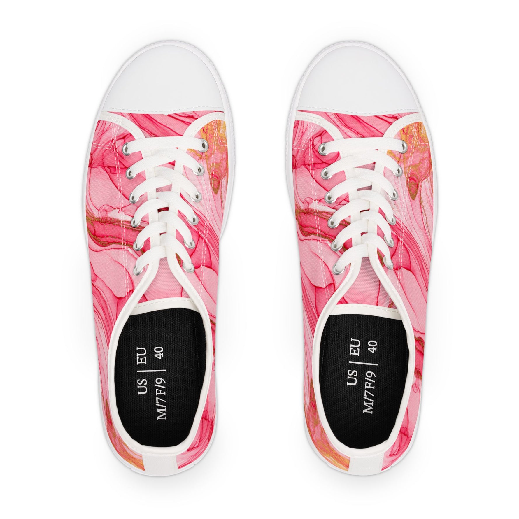 Pair of sneakers with pink and orange abstract pattern on a white background
