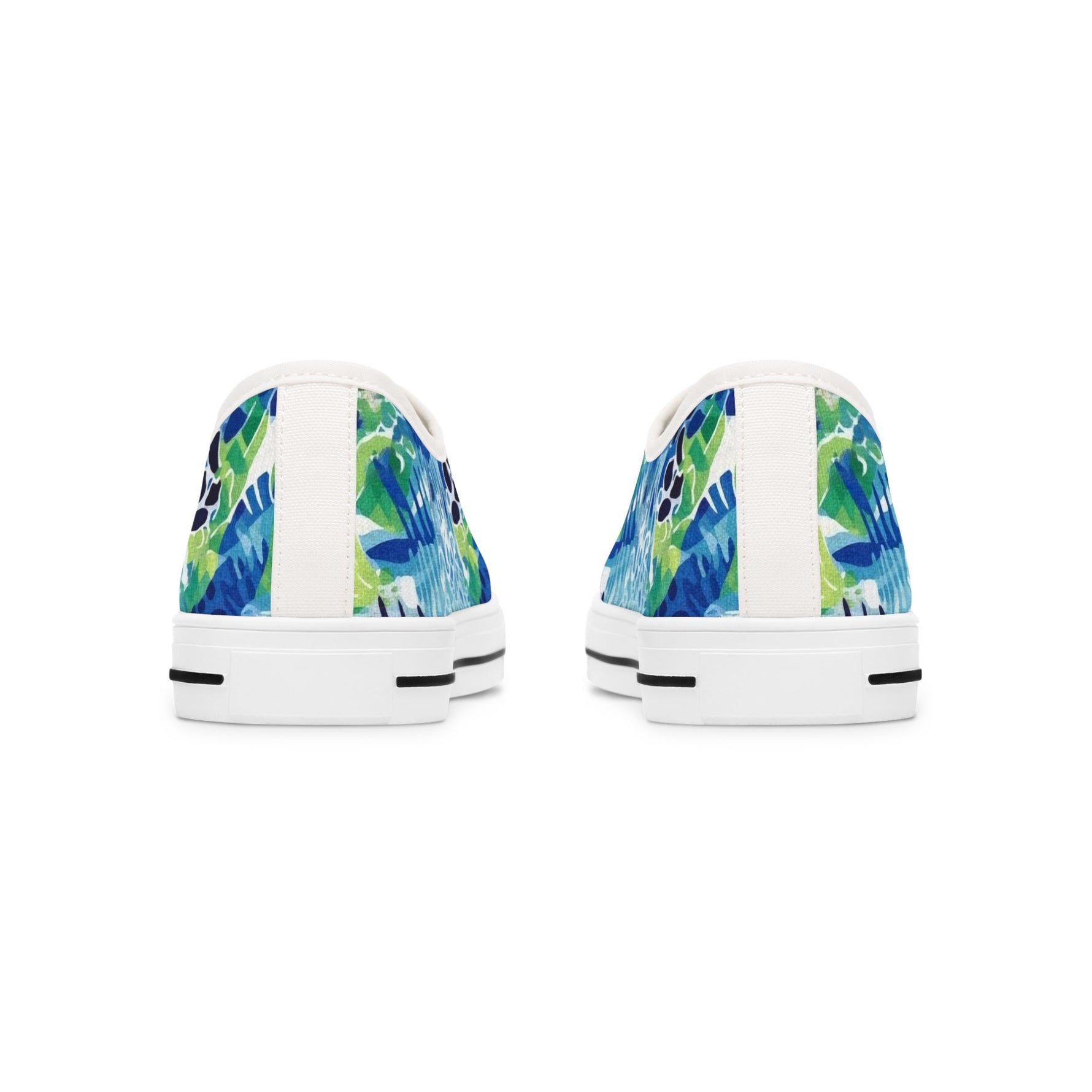 Pair of women's white sneakers with blue and green abstract pattern on a white background