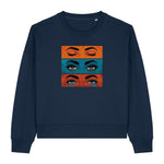 Stanley/Stella Navy blue sweatshirt with eye design in orange, blue, and red on a white background