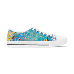 Womens sneaker with a colorful abstract pattern on a white background