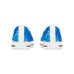 Pair of blue and white sneakers on a white background