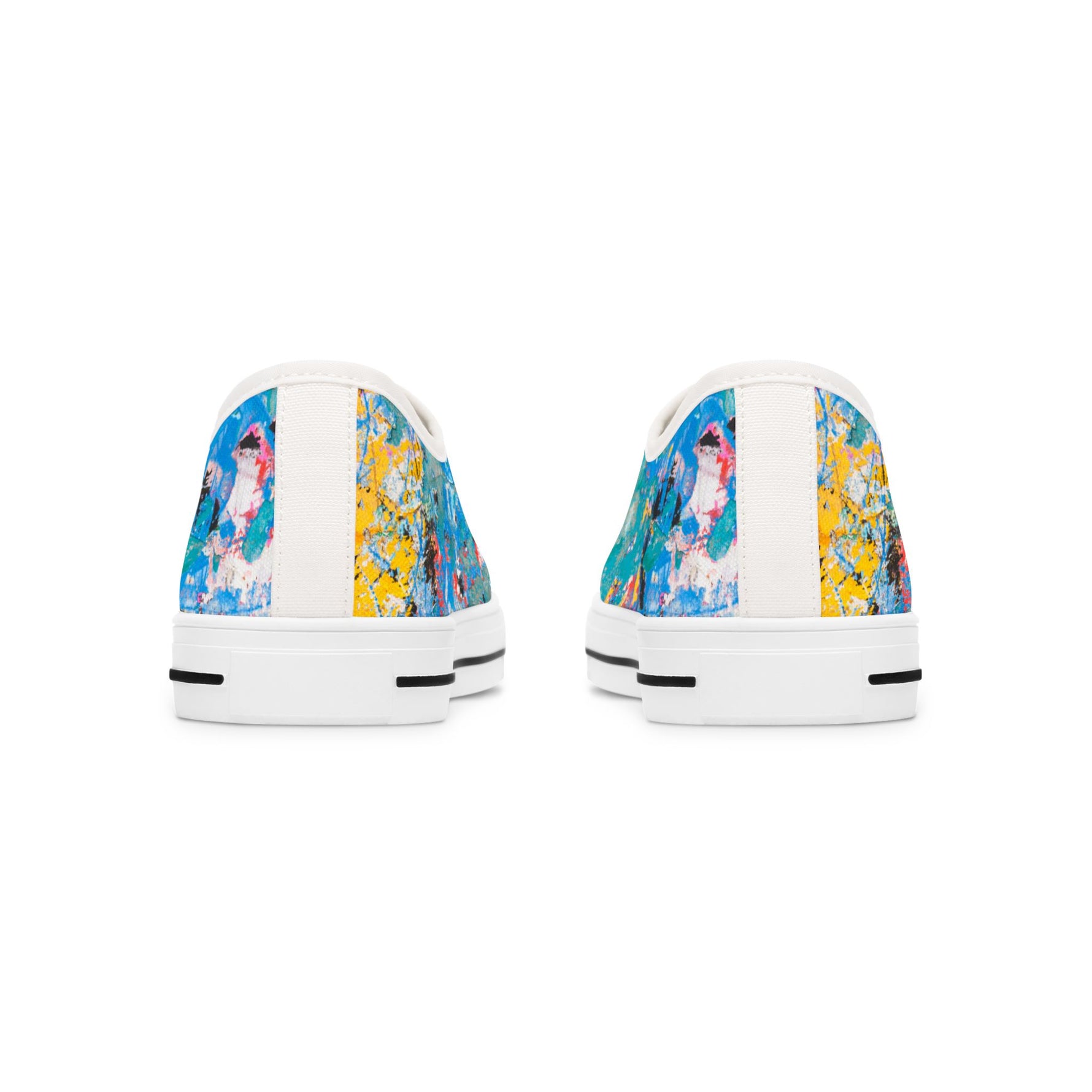 Pair of womens sneakers with colorful abstract design on a white background