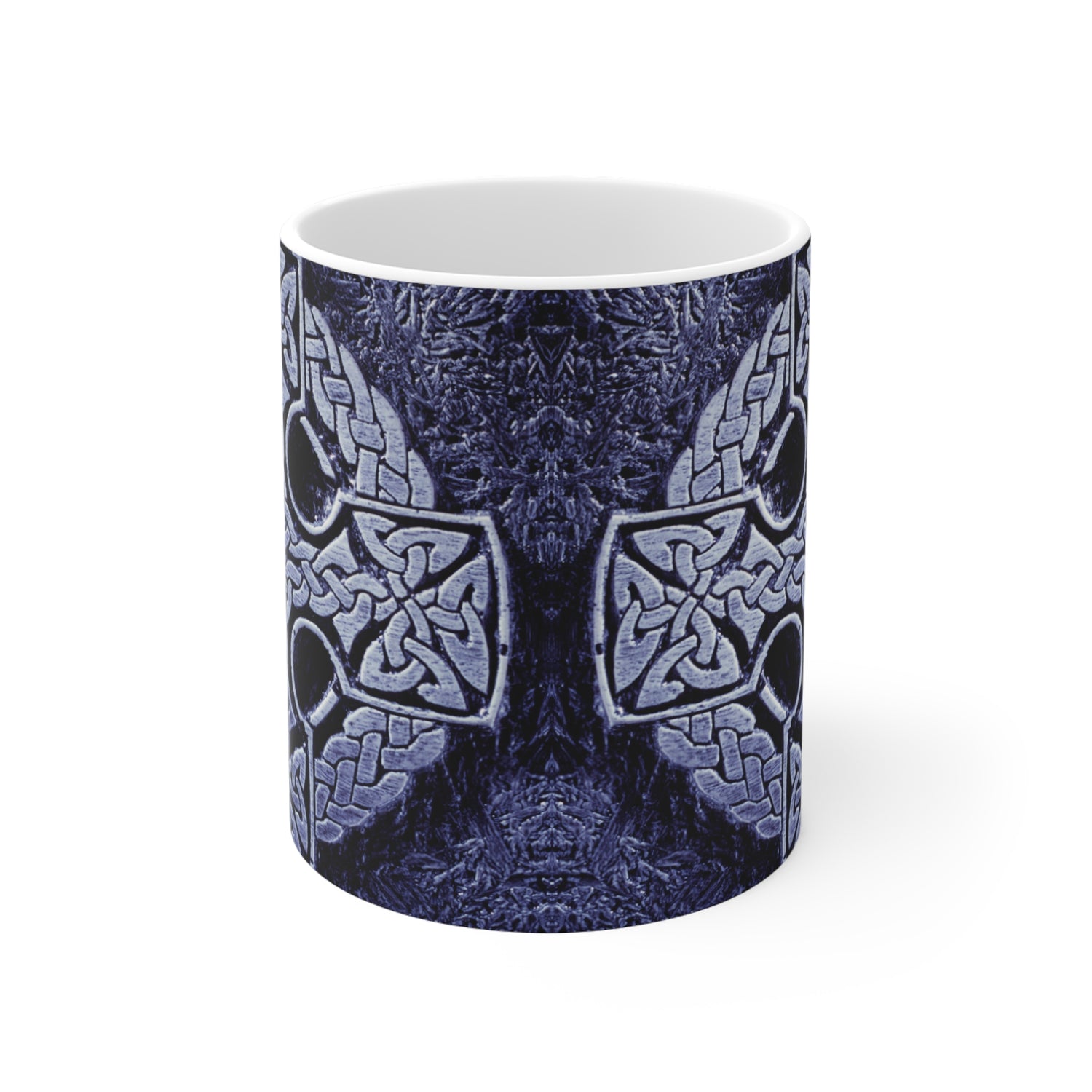 Ceramic mug with Celtic cross design on a white background