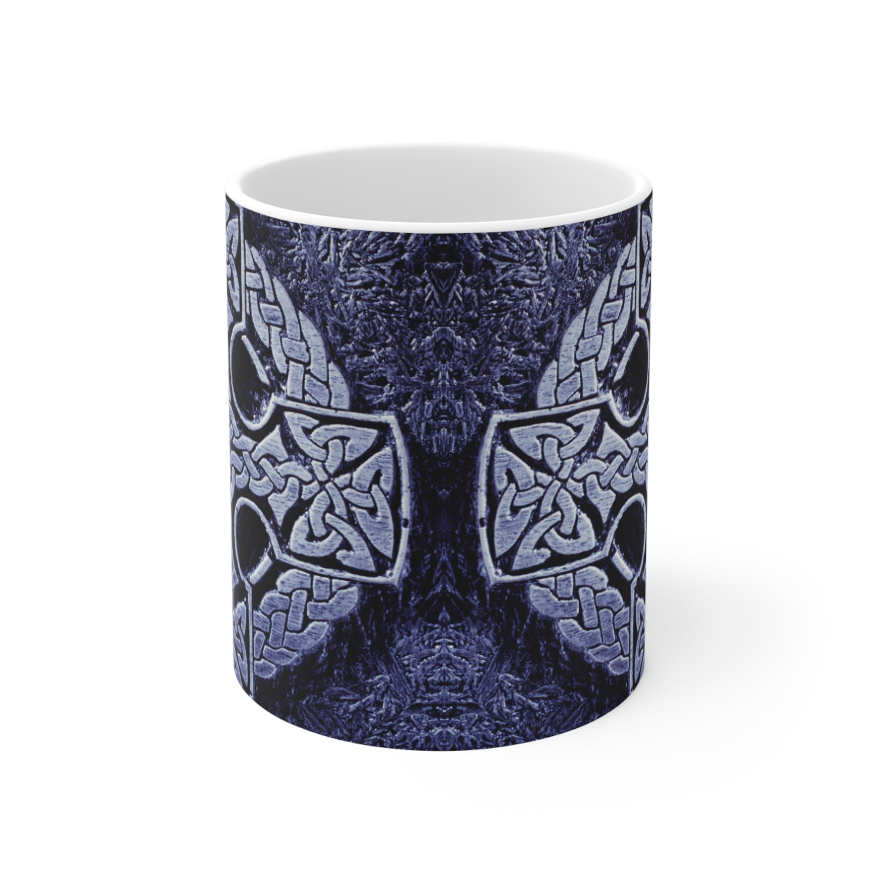 Ceramic mug with Celtic cross design on a white background