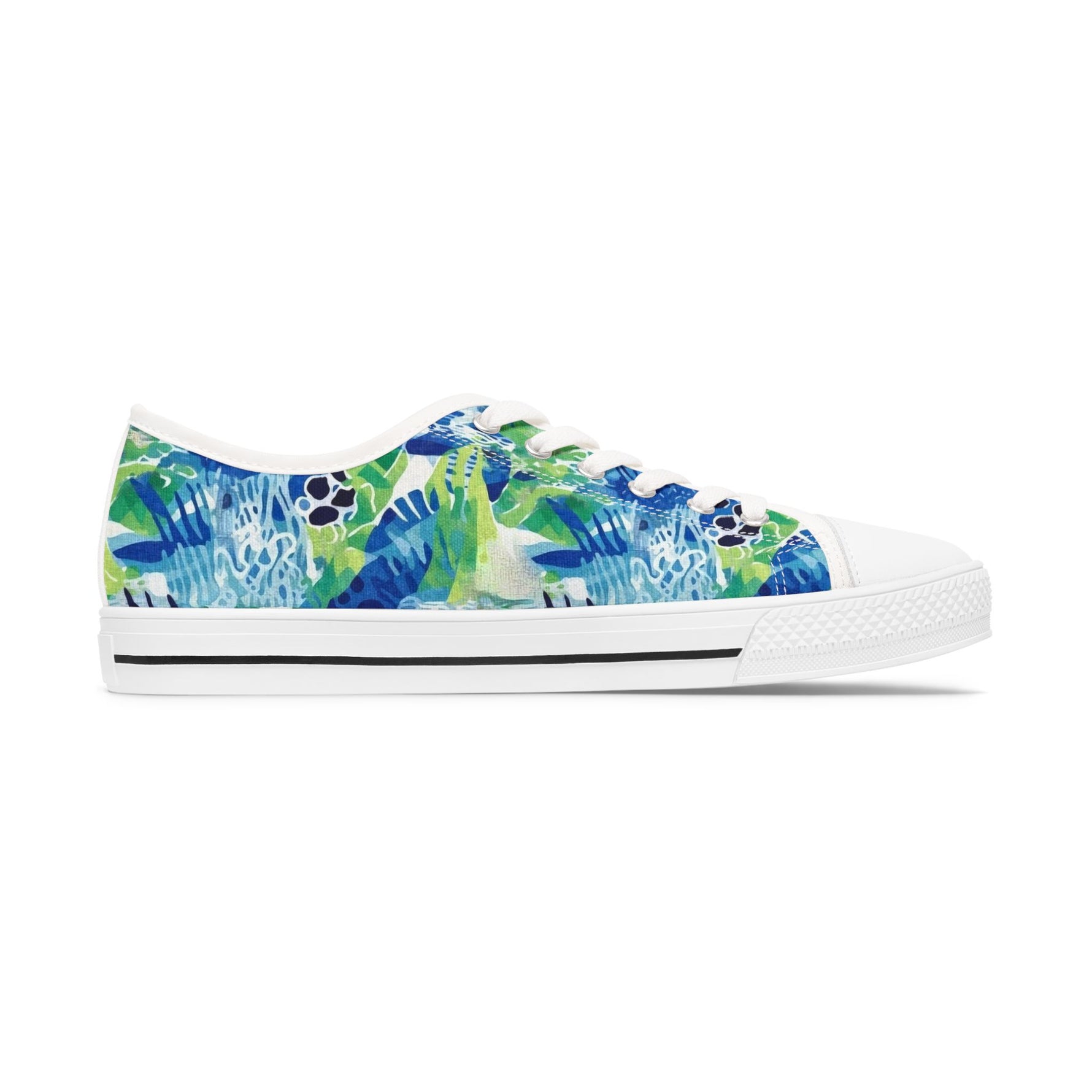 White sneaker with blue and green floral pattern on a white background