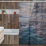 Bathroom with wooden vanity and shower curtain featuring wavy water design