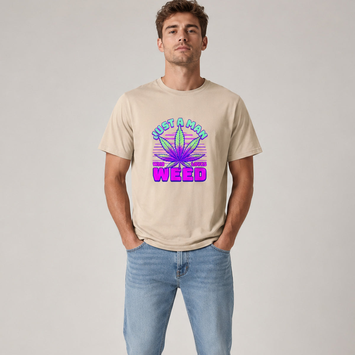 Man wearing a beige t-shirt with a colorful graphic and text on a plain background