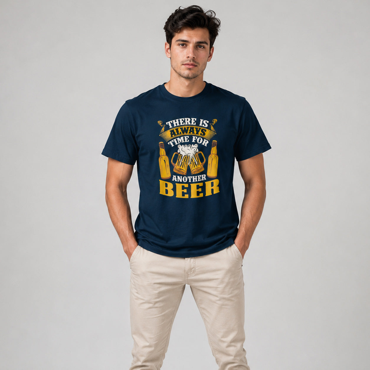 Man wearing a navy blue t-shirt with a humorous beer graphic and text on a plain background