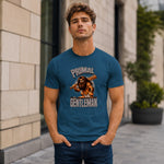 Man wearing a blue t-shirt with 'Primal Gentleman' graphic design outdoors.
