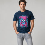 Man wearing a navy blue t-shirt with a colorful bear graphic on a gray background