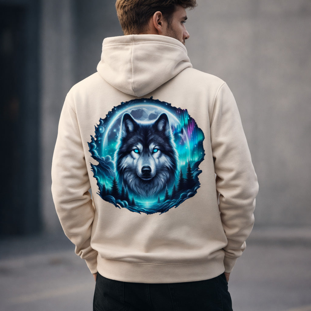 Men's wearing a beige hoodie with a wolf graphic on the back against a blurred background