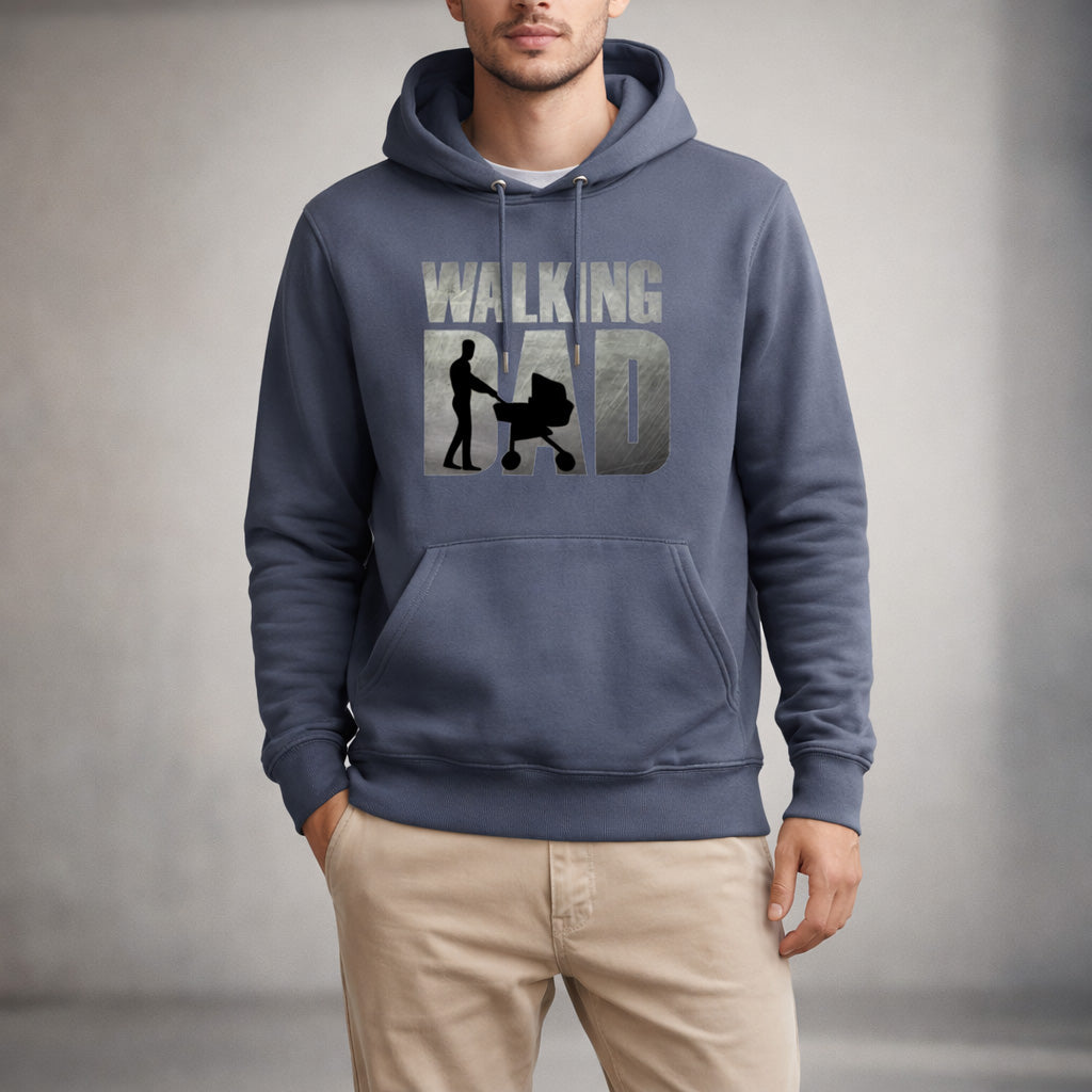 A man wearing a blue hoodie with the text "WALKING DAD" and a graphic of a man pushing a stroller. He is also wearing beige pants and standing against a neutral background.