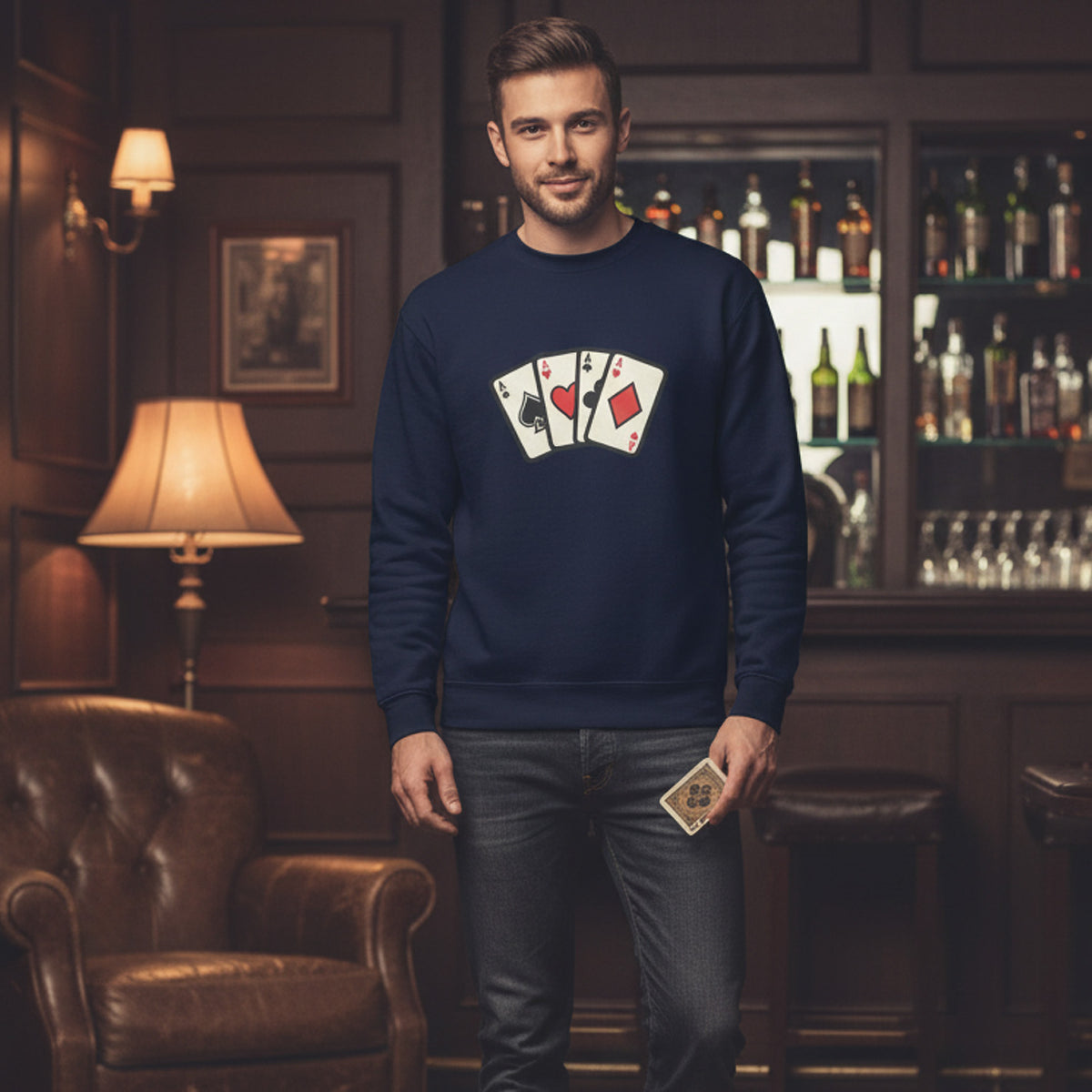 Man wearing a navy blue sweatshirt with playing card design in a bar setting