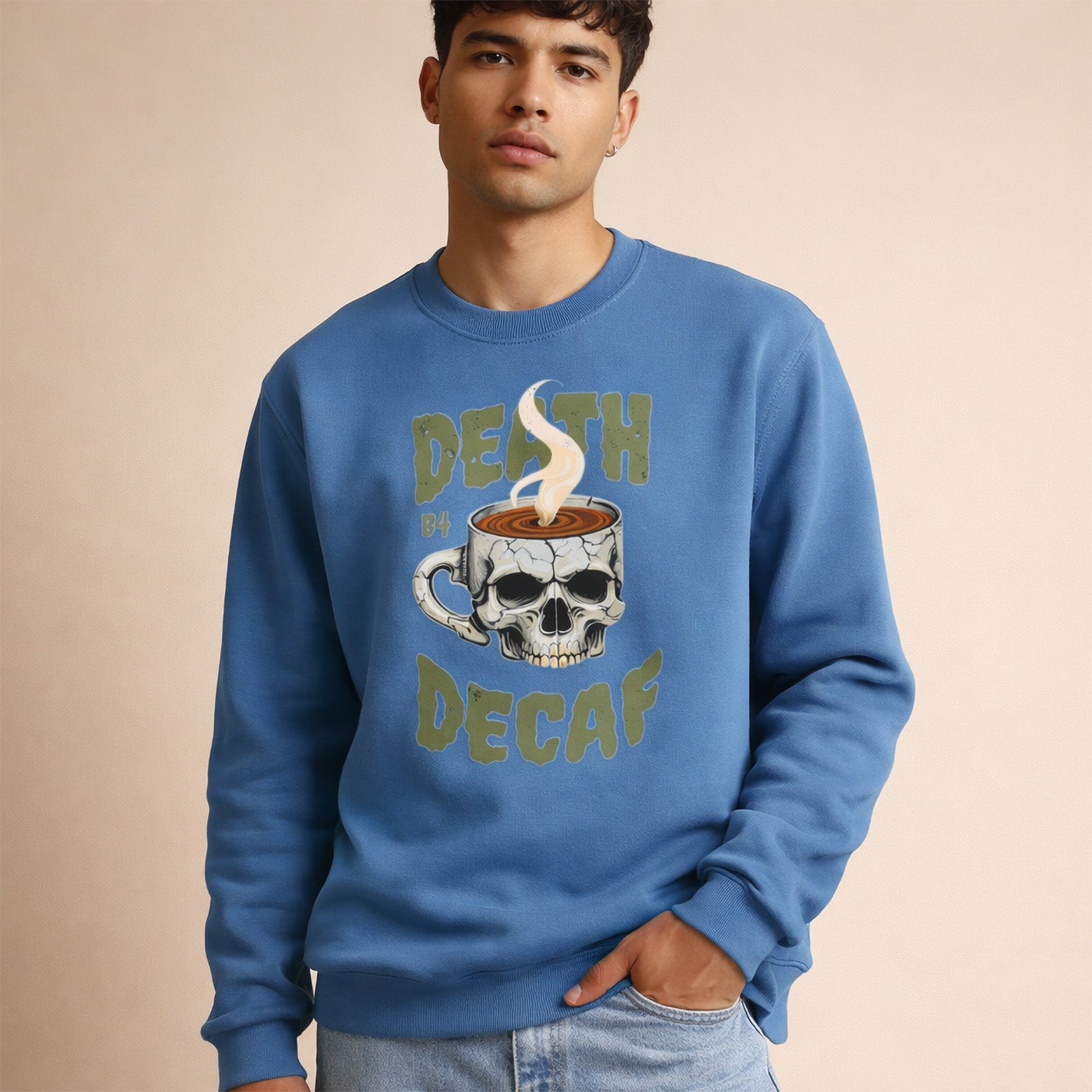 Man wearing a blue sweatshirt with a skull and coffee cup graphic and text.