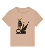 A beige short-sleeve crewneck womens t-shirt featuring a graphic print of a stylized jester crown in black and gold with the word 'QUEEN' integrated vertically, shown on a plain white background.