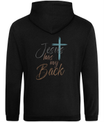 A black pullover hoodie shown from the back, featuring a graphic print with the text 'Jesus has my Back' in gray and brown script, accented by a teal cross.