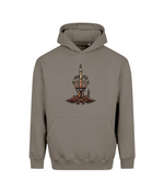 A taupe-brown pullover hoodie with a central graphic of a skeletal hand holding up a middle finger over a pile of coins, shown on a plain white background.