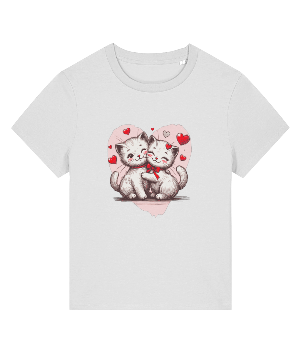 A womens light gray short-sleeve crewneck t-shirt featuring a cute graphic print of two hugging white kittens inside a pink heart with red hearts.