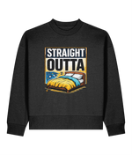 A dark gray crewneck womens sweatshirt featuring a graphic print on the front with the text 'STRAIGHT OUTTA' above an illustration of a bed with a yellow blanket and blue bedding.