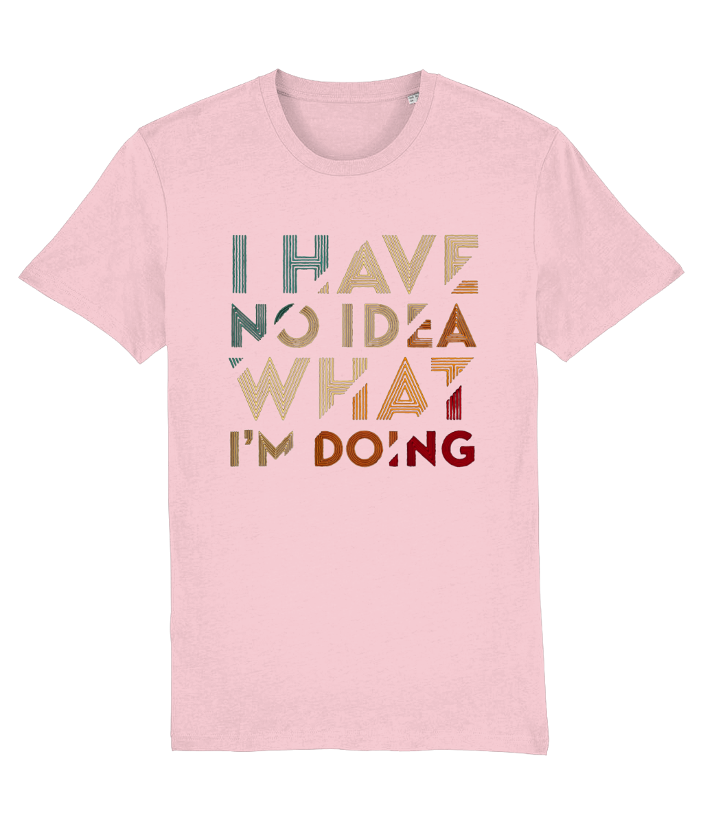 A light pink short-sleeve womens crewneck t-shirt featuring the text 'I HAVE NO IDEA WHAT I'M DOING' printed on the front in a retro, multi-colored distressed font.