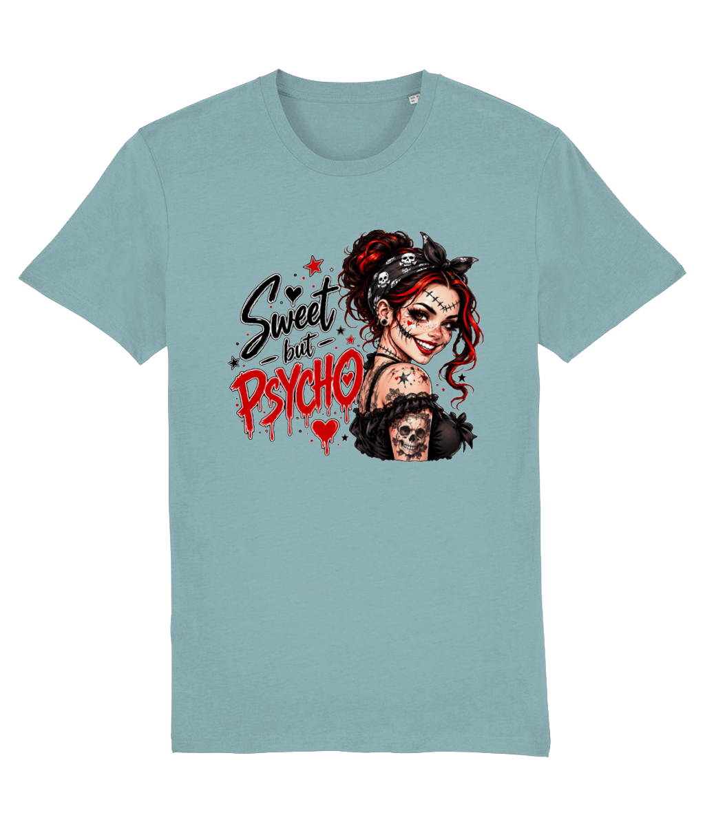 A light blue womens crewneck t-shirt featuring a graphic print of a stylized woman with red hair, a bandana, and a skull, accompanied by the text 'Sweet but Psycho' in black and red lettering.