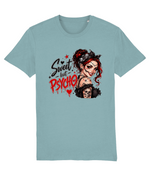 A light blue womens crewneck t-shirt featuring a graphic print of a stylized woman with red hair, a bandana, and a skull, accompanied by the text 'Sweet but Psycho' in black and red lettering.