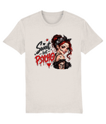 A light beige womens crewneck t-shirt featuring a graphic print of a woman with red hair, a bandana, and a skull, alongside the text 'Sweet but Psycho' in black and red.