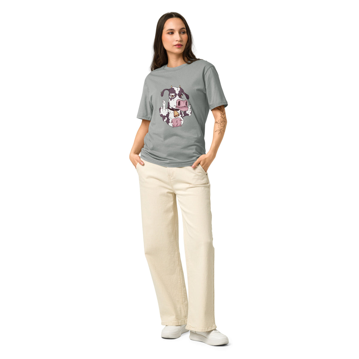 Woman wearing Stanley/Stella  gray t-shirt with colorful graphics and text, standing against a white background
