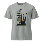 A light gray mens crewneck t-shirt featuring a large graphic on the chest that combines the word 'KING' with a stylized crown, rendered in black with a gold and blue 3D shadow effect.