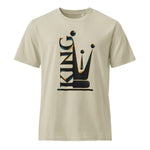 A beige mens crewneck t-shirt featuring a large graphic on the front that combines the word 'KING' with a stylized crown, rendered in black with a subtle gold outline.