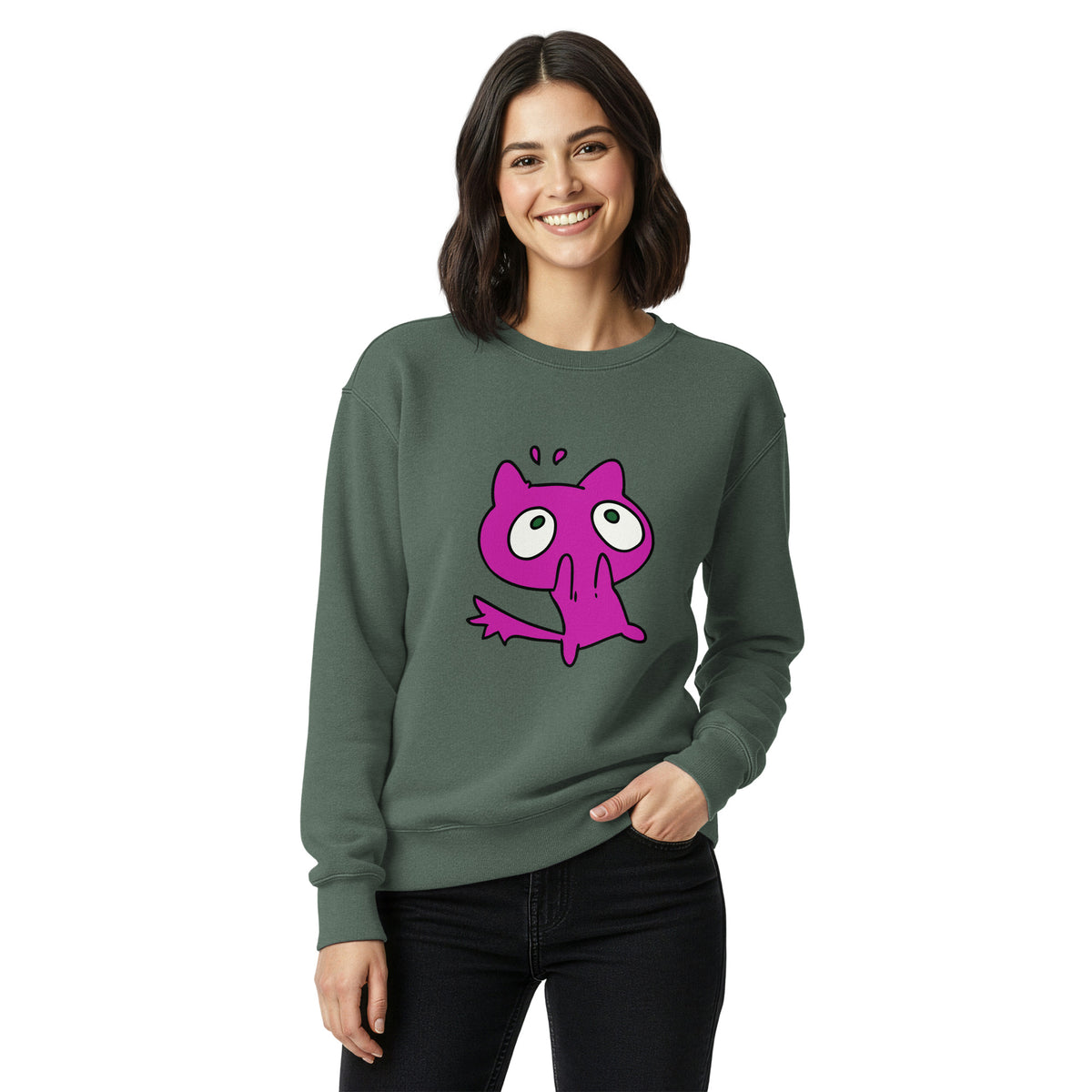 Woman wearing a green sweatshirt with a pink cartoon character on a white background