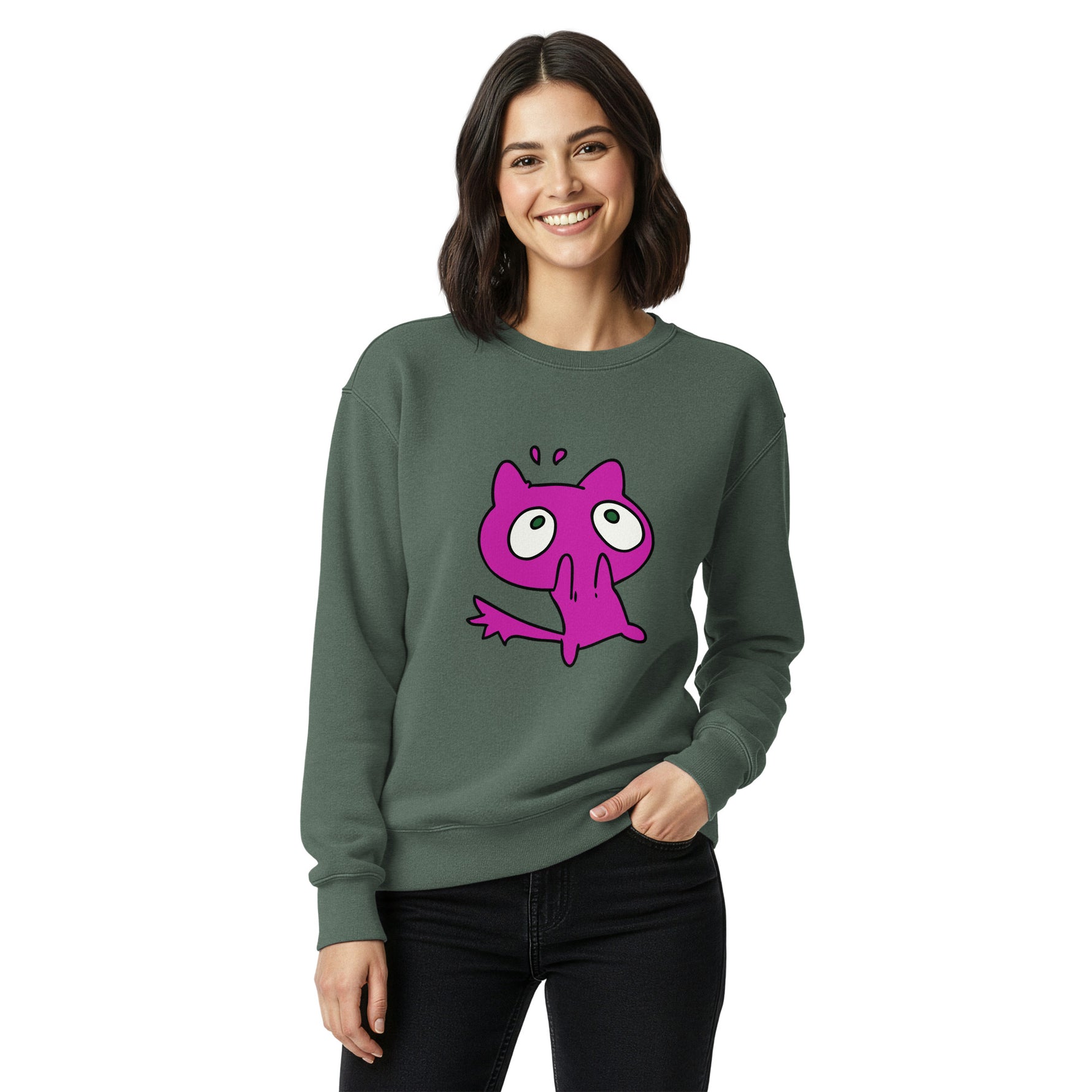 Woman wearing a green sweatshirt with a pink cartoon character on a white background