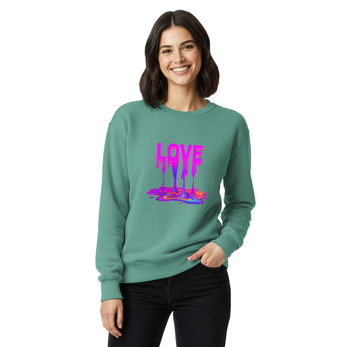 Woman wearing a teal sweatshirt with colorful text design on a white background