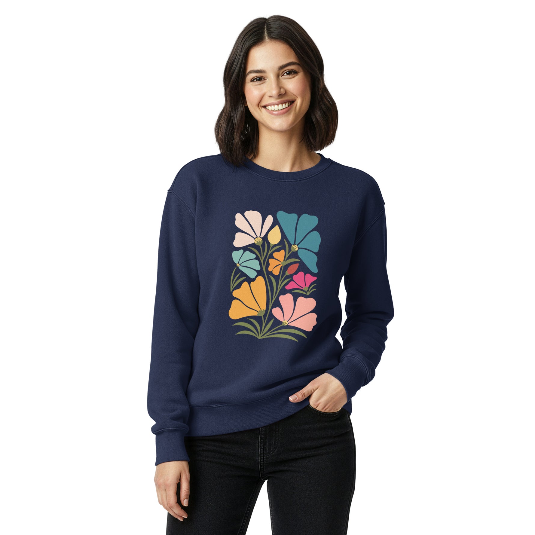 Woman wearing a navy blue sweatshirt with colorful floral design on a white background